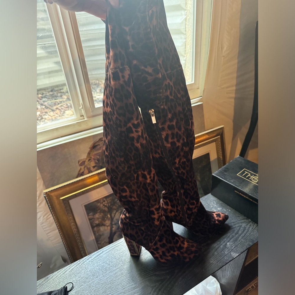 Long heeled cheetah print boots